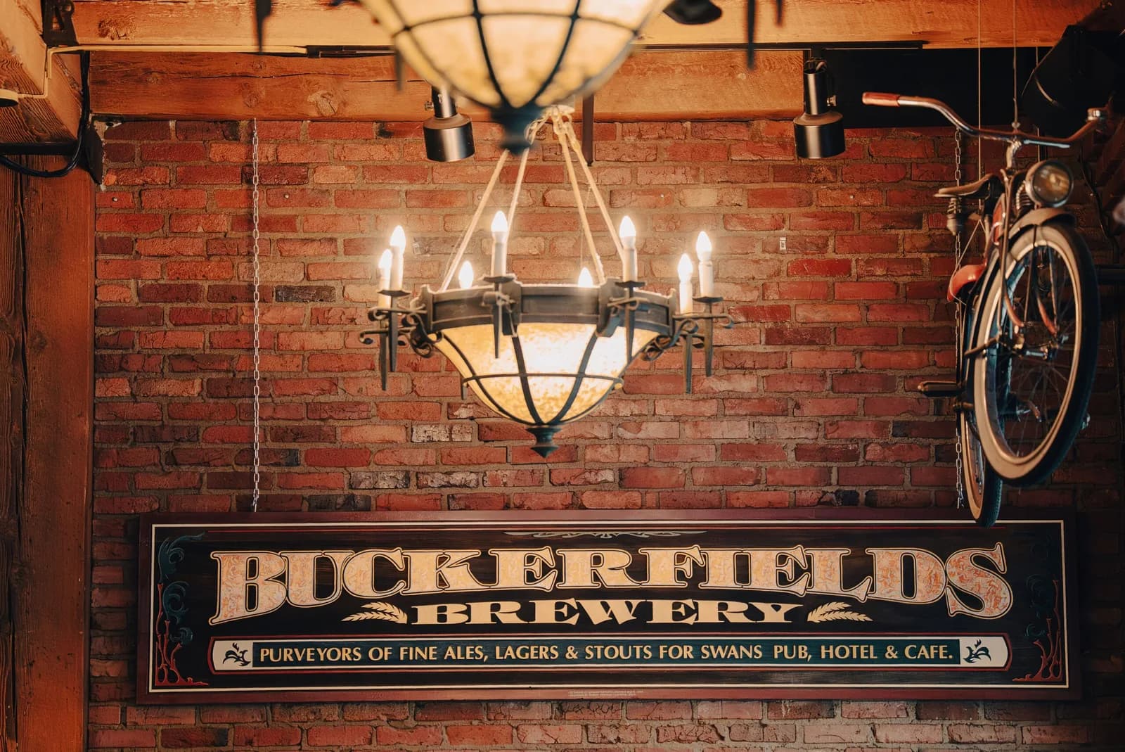 The old Buckerfields sign on Swan's brick wall today