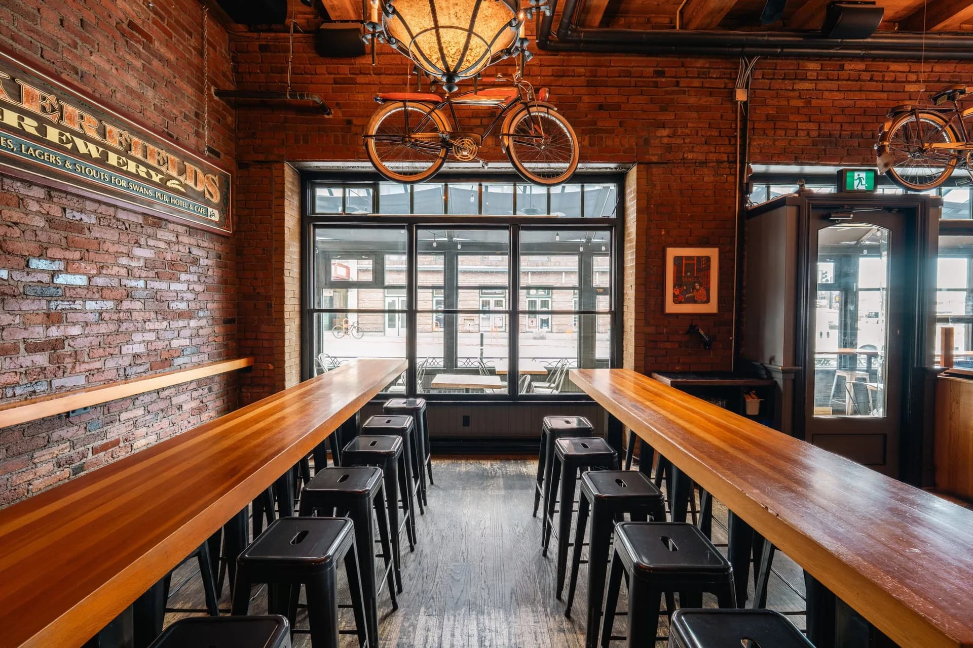 High-top group seating inside Swan's