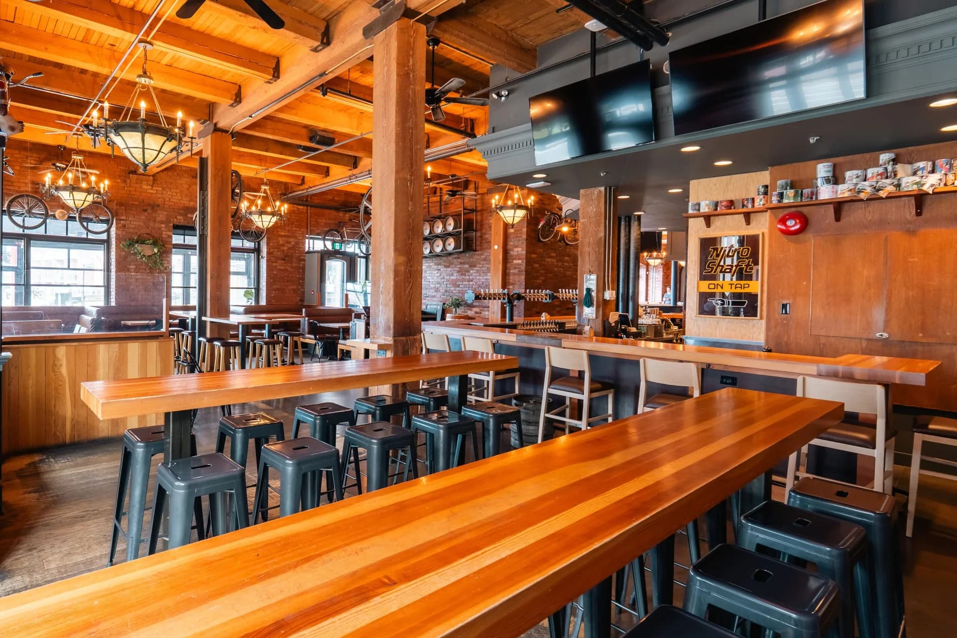 The timber, brick and dining room inside Swan's Pub